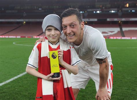 mesut ozil with his charity